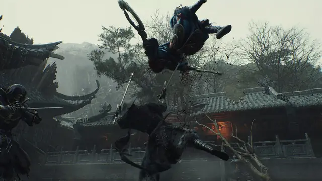 Soul fights airborne enemies on rooftops in a misty mountain village