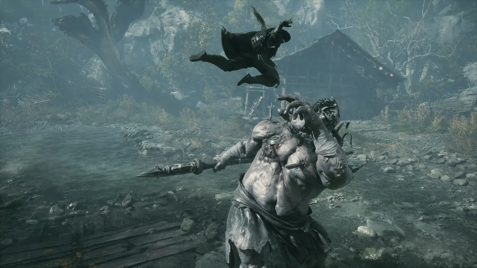 Soul leaps over a giant pale brute with a spear beside a river