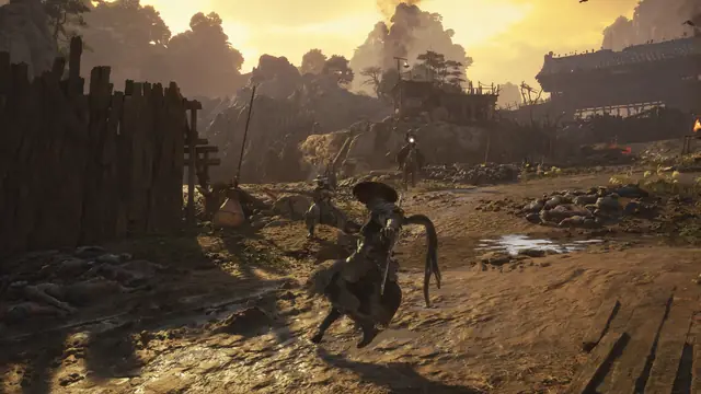 Soul fights in a sunlit village behind a wooden palisade